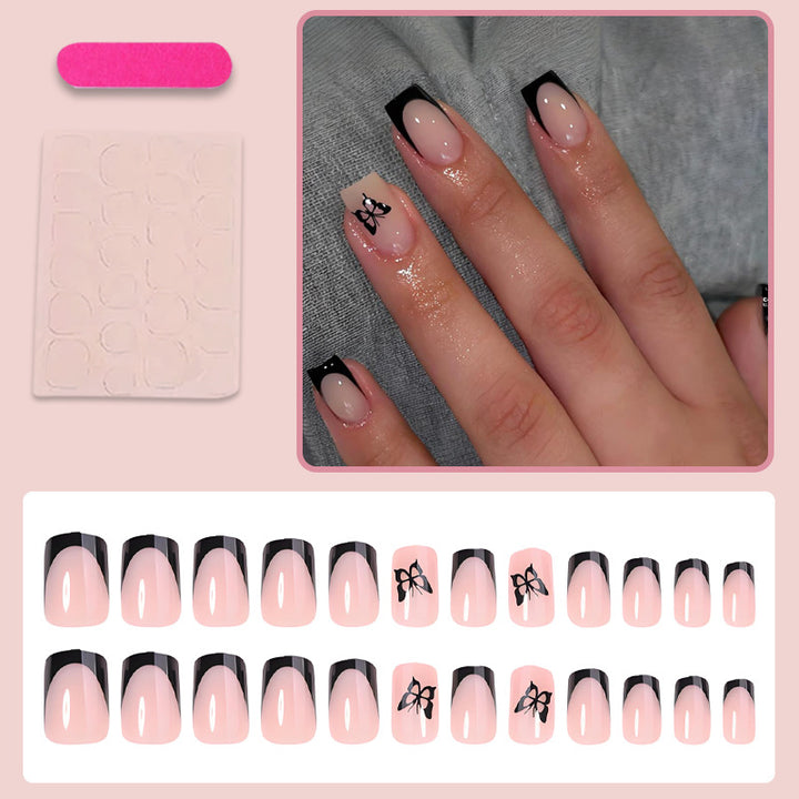 Glamorous artificial nail set with filigree butterfly designs Stornfield
