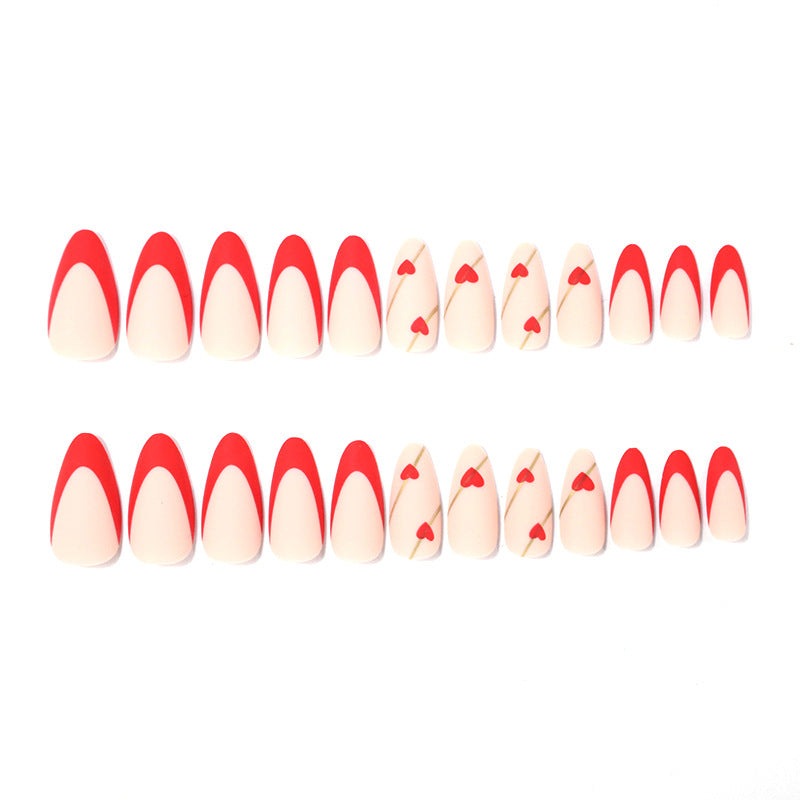 Artistic Heart-Embellished Nail Art Stornfield