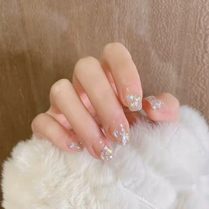 Glittering artificial nails with holographic accents Stornfield