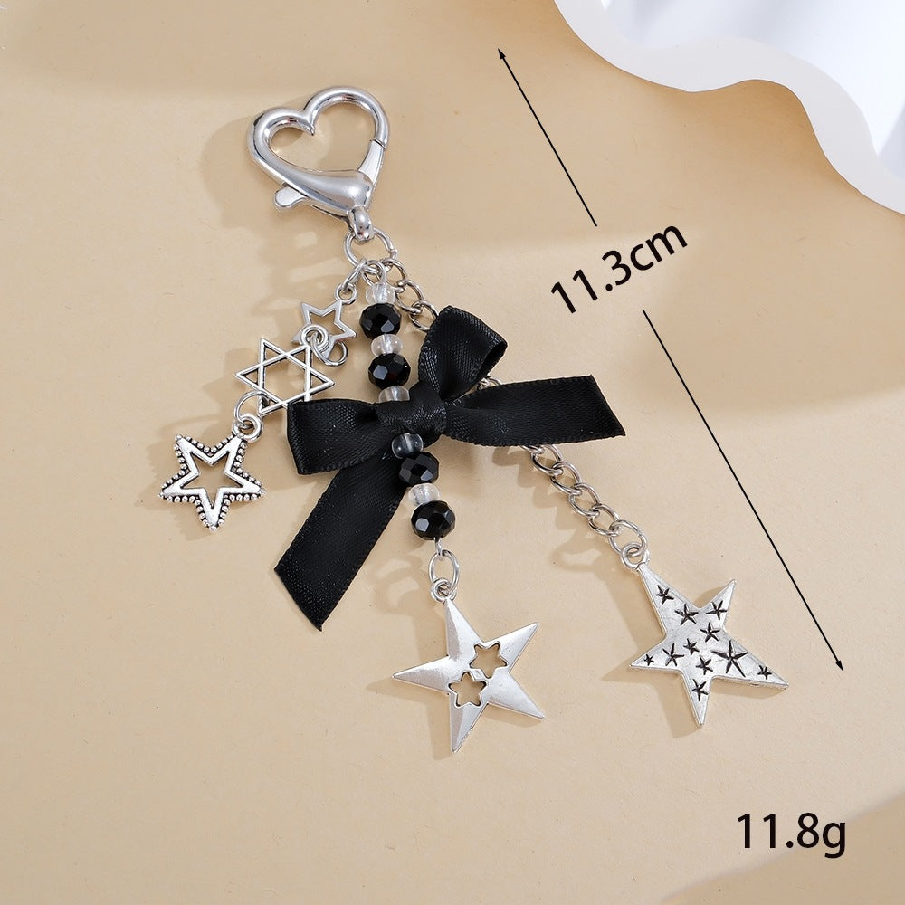 Keychain with Sparkling Stars and Bow Design Stornfield