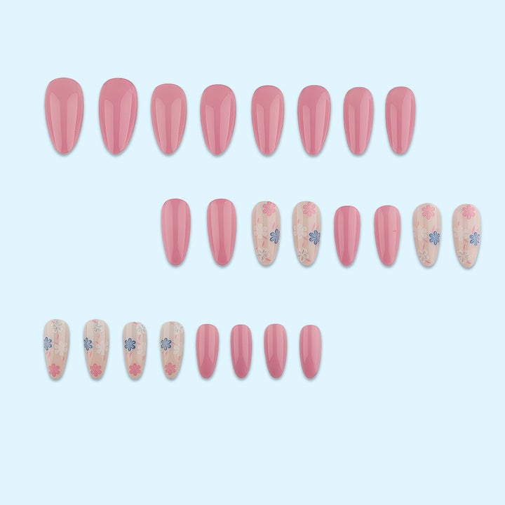 Stylish almond-shaped artificial nails with floral patterns Stornfield