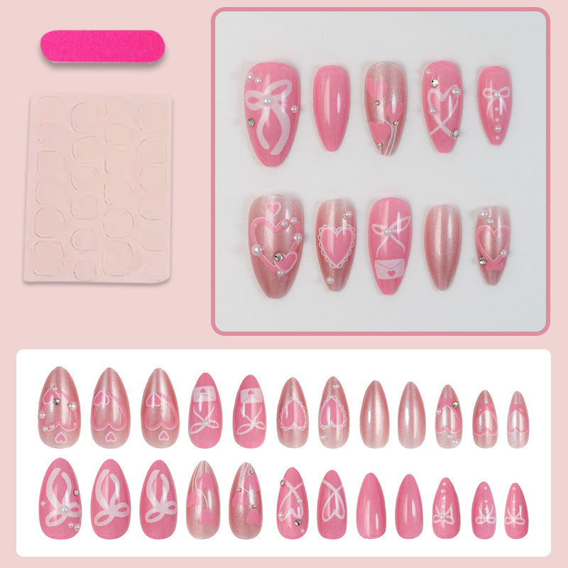 Premium artificial nail set with romantic heart and bow designs Stornfield