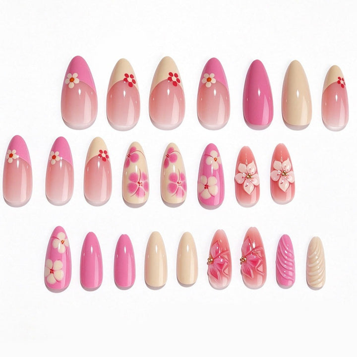 Artificial nail set with floral accents and glitter elements Stornfield