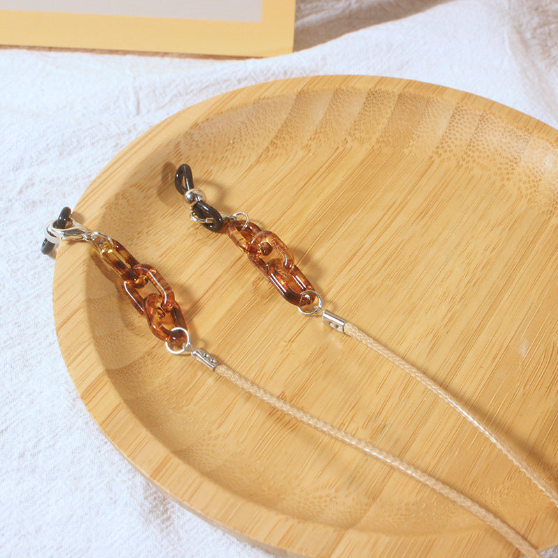 Fashionable glasses strap with pendants Stornfield