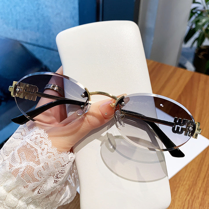 Ladies fashionable sunglasses in elegant oval design Stornfield