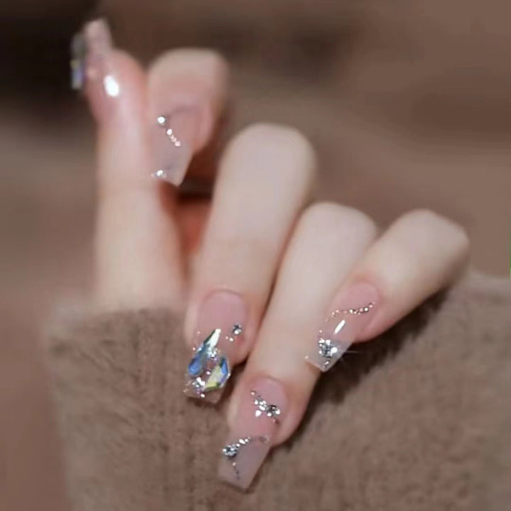 Glamorous artificial nails with glitter accents Stornfield