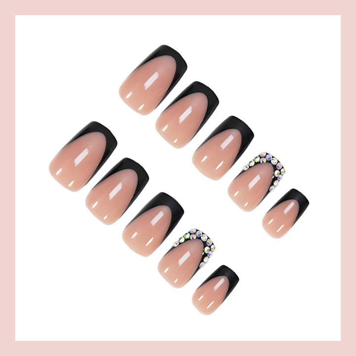 Artificial nail set with elegant black tips and sparkling accents Stornfield