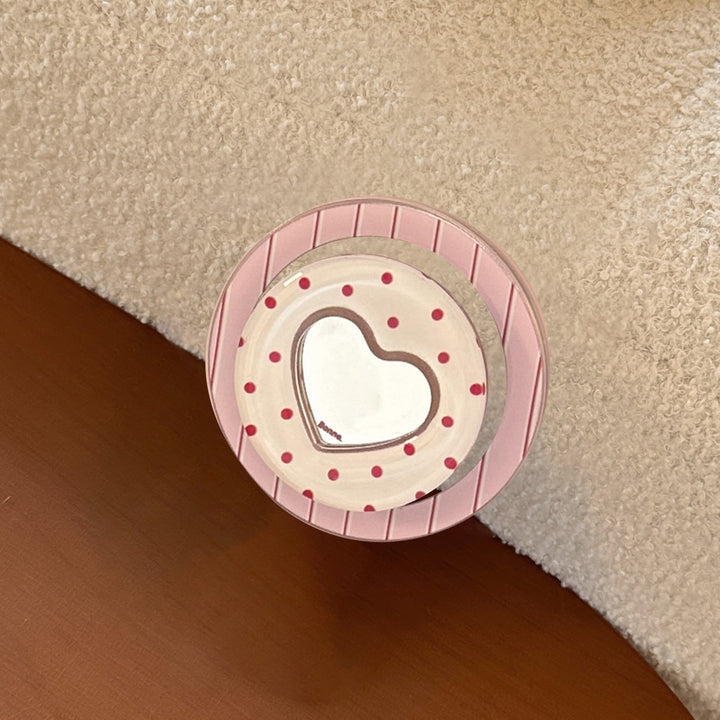 Heart-shaped coaster with playful design Stornfield