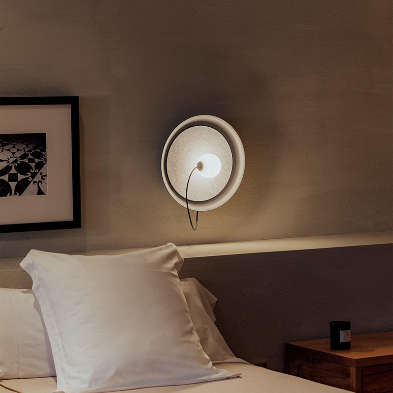 Modern Wall Sconce with Fabric Backdrop and Soft Glow
