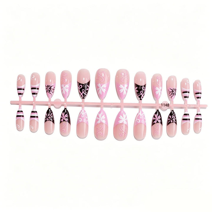 Artificial nail set with decorative flower-like and geometric designs Stornfield