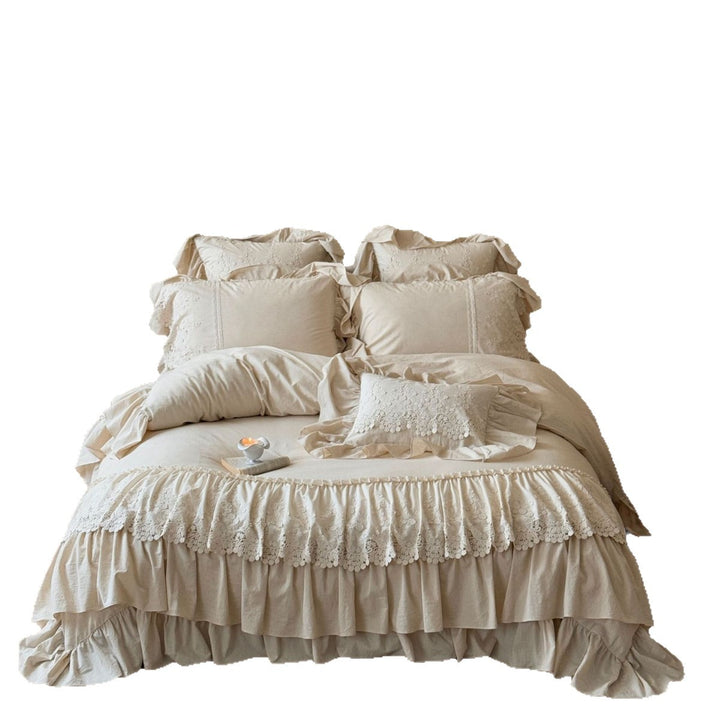 Vintage-inspired duvet cover set with layered ruffles and lace appliqué
