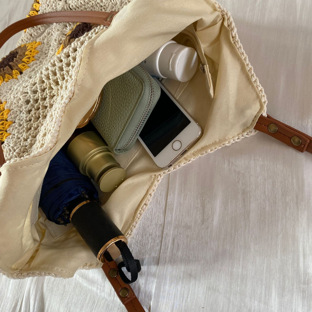 Hand-knotted shoulder bag with sunflower pattern Stornfield