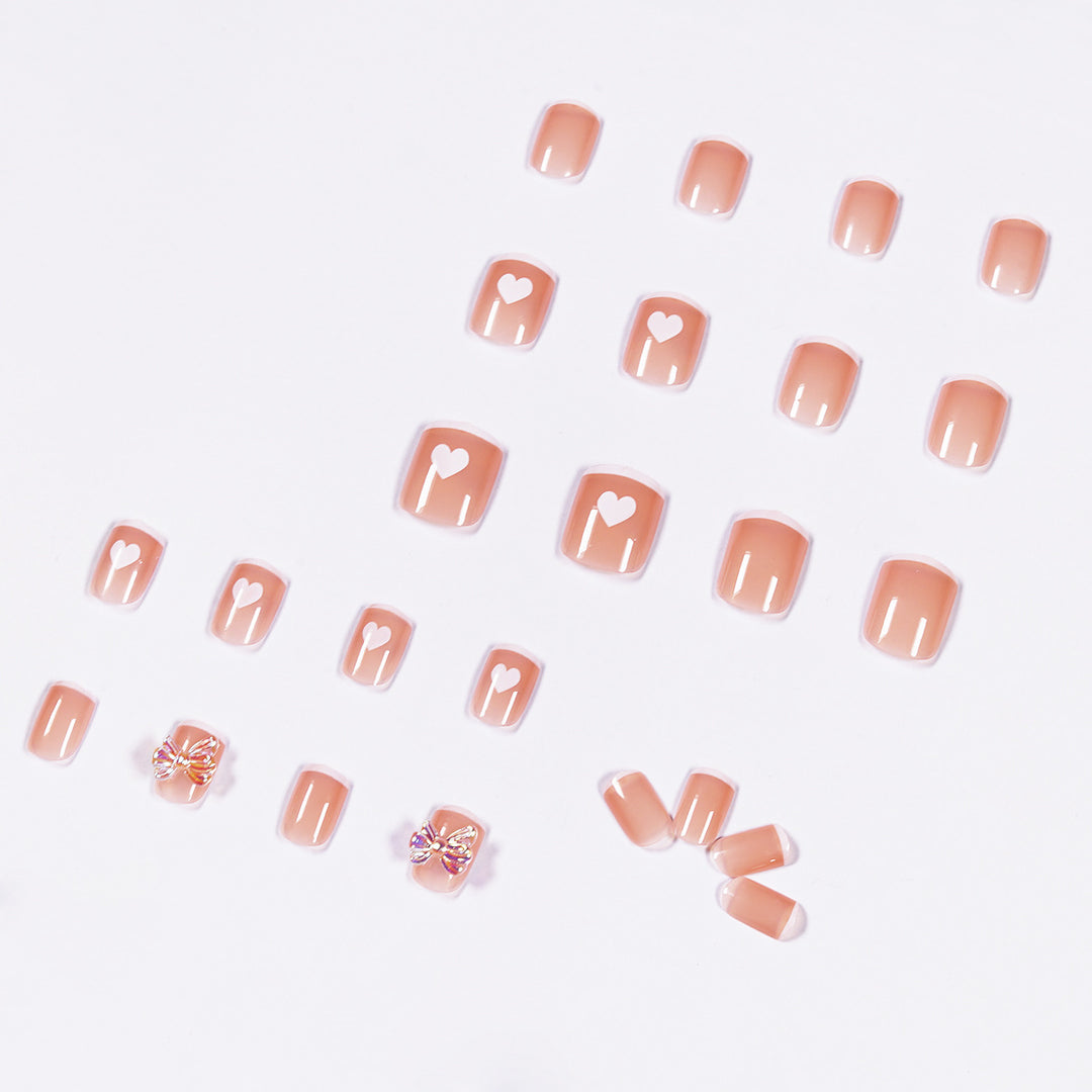 Nail art with heart and butterfly motifs Stornfield