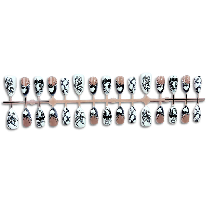 Artistic Press-On Nail Art Set with Unique Graphic Designs
