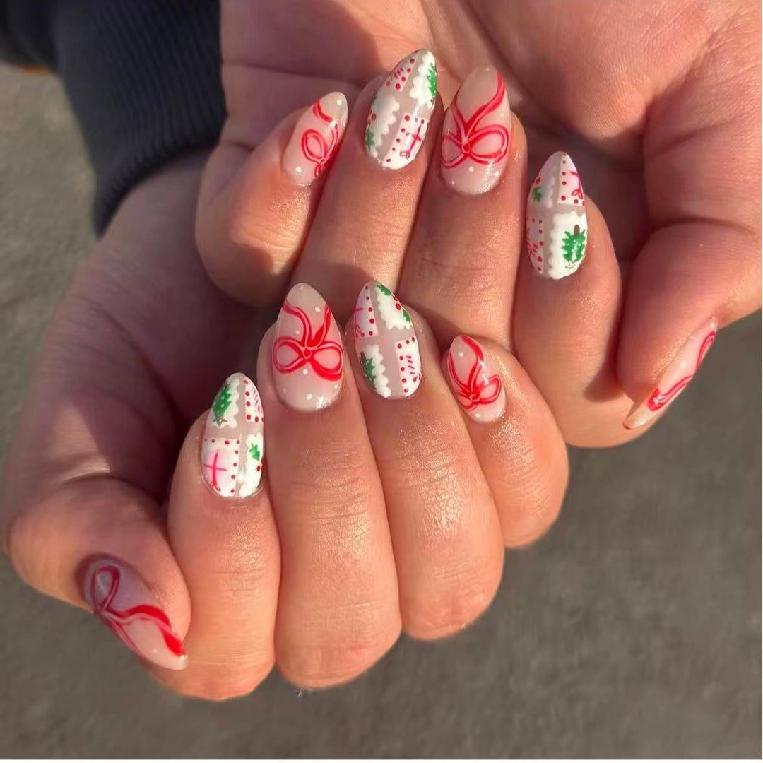 Artificial nail set with festive gift and bow motifs Stornfield