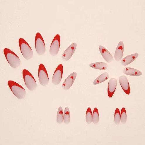 Heart-Embellished Stiletto Nail Art Stornfield