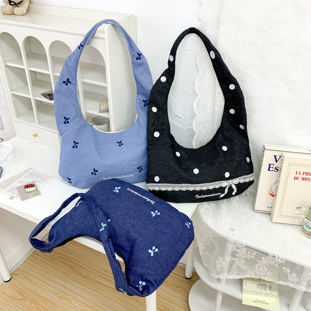 Comfortable shoulder bag with original embroidery motif Stornfield