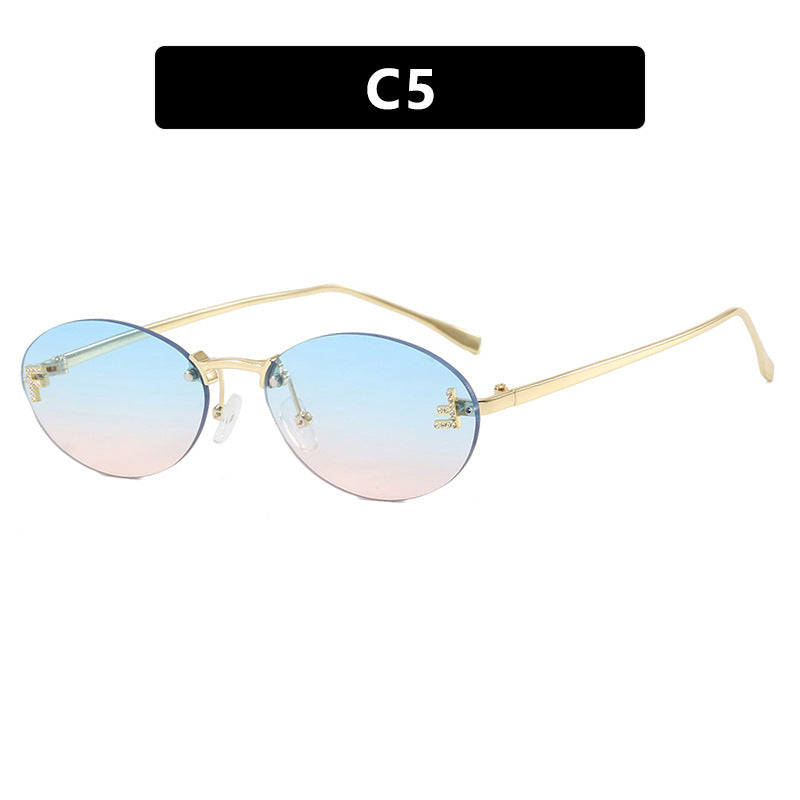 Women's fashionable sunglasses with elegant, round lenses and delicate metal frame Stornfield