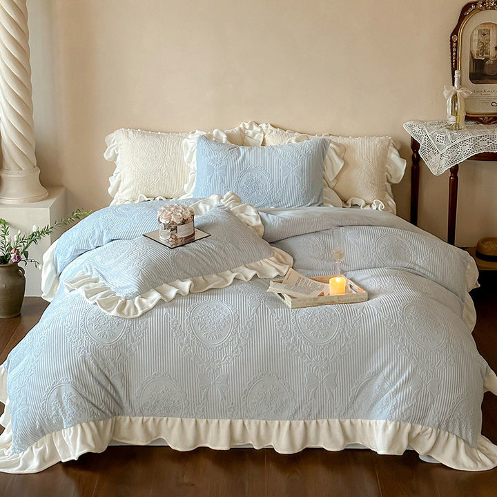 Ruffled quilted bedding set with jacquard medallion and ruffle