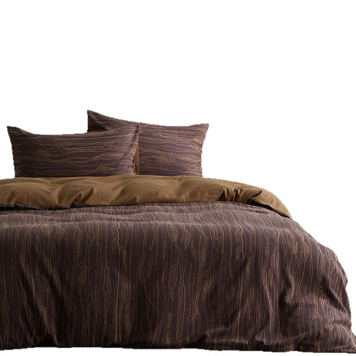 Modern bedding set made of cotton percale with organic stain pattern