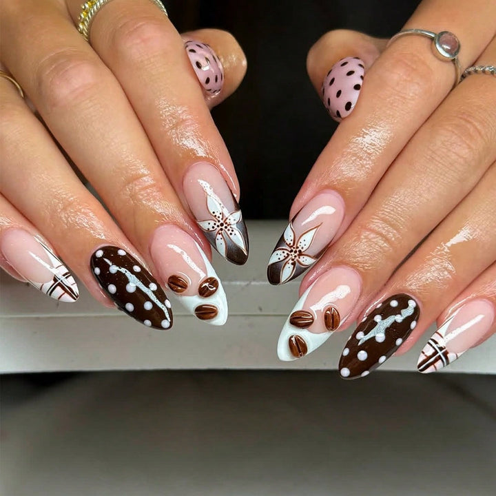 Artificial nails with elegant floral design and creative accents Stornfield