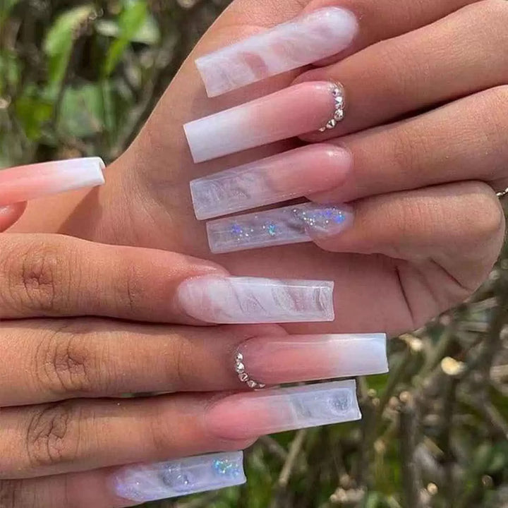 Artificial nail set with glamorous 3D accents and transparent design Stornfield
