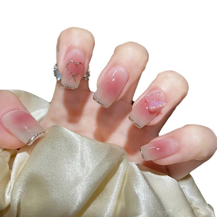 Artificial art nails with heart and glitter elements Stornfield