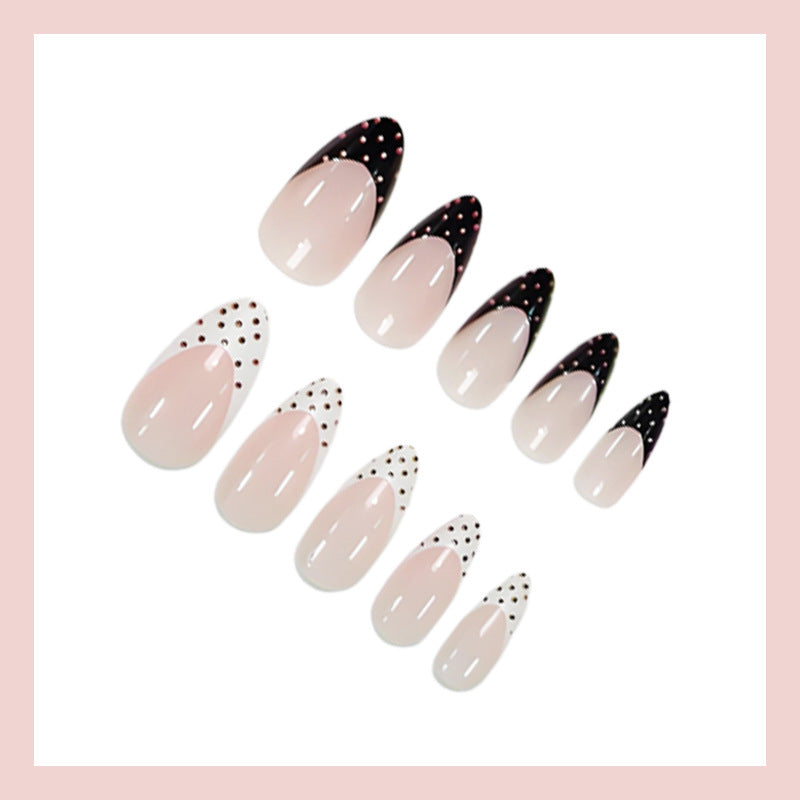 Artificial nail set with circular dots and modern tips Stornfield