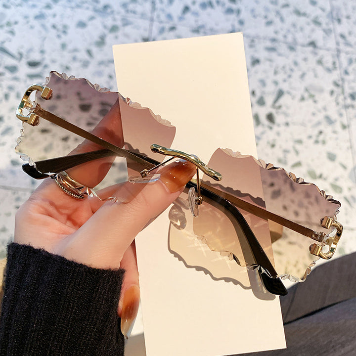 Ladies fashionable sunglasses with playful frame Stornfield