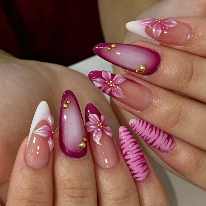 Artificial nail set with floral accents and ombre effect Stornfield