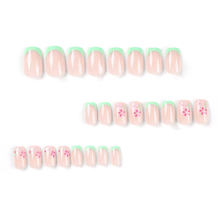 Artificial nails with floral accents and neon tips Stornfield