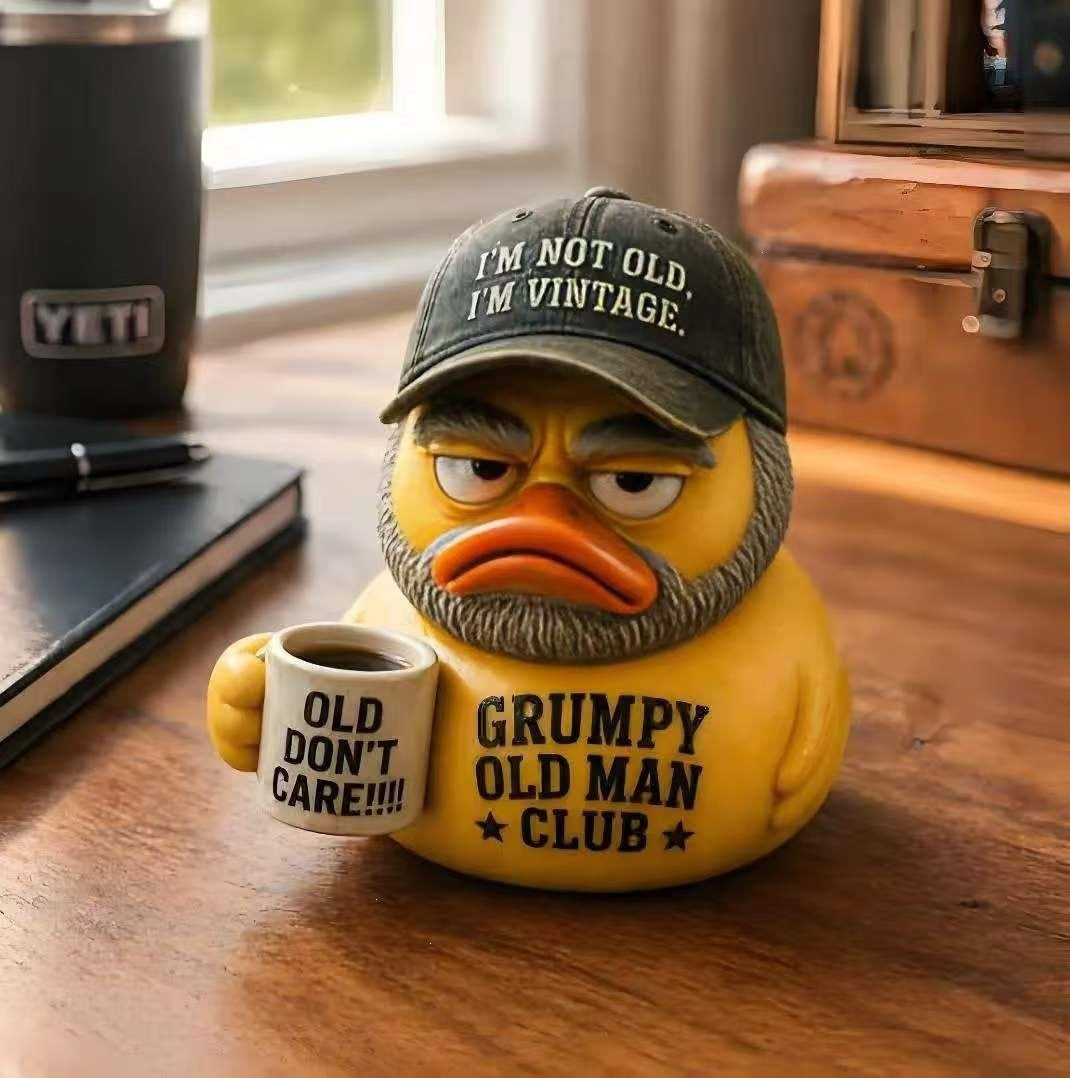 Funny rubber duck with vintage hat and cup Stornfield