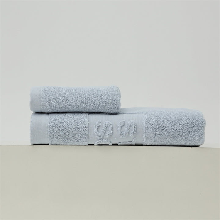 Luxury cotton terry towel set with logo border and extra soft Turquetto structure