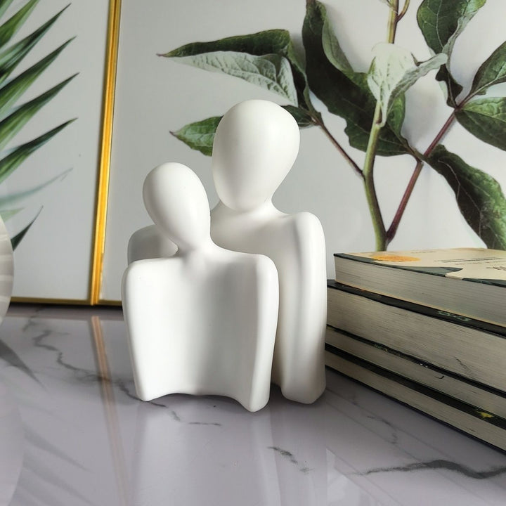 Artistic Dual Figure Decoration Stornfeild