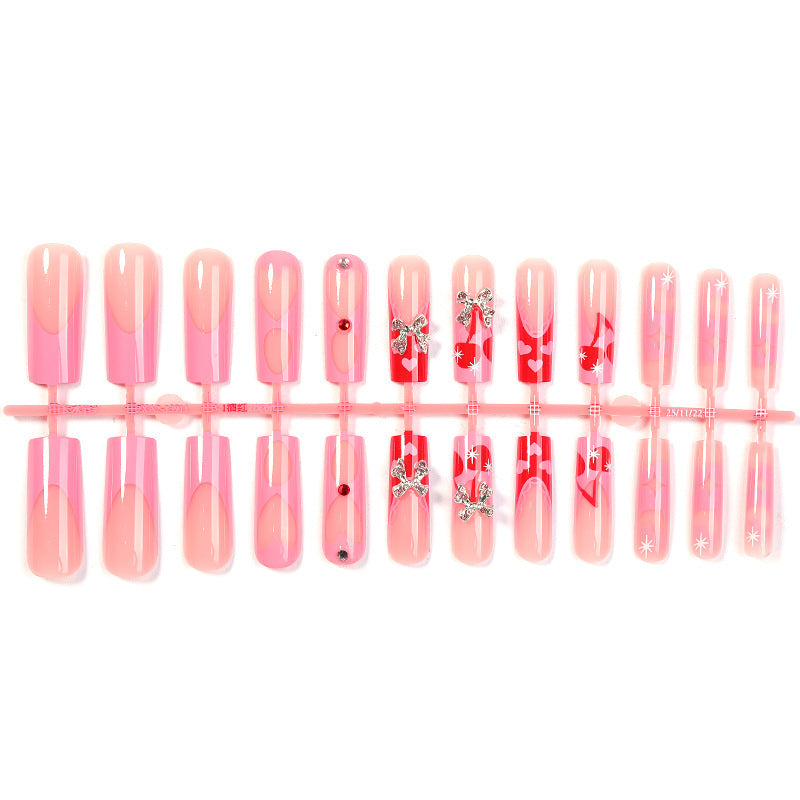Creative nail art set with glitter and heart designs Stornfield
