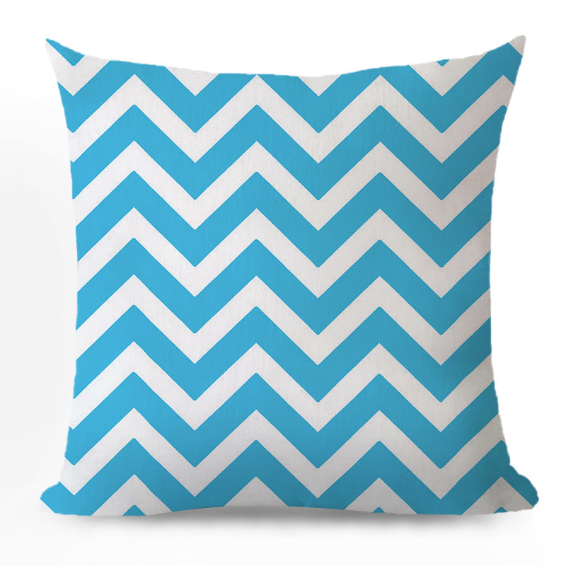 Decorative cushion with zigzag pattern from
