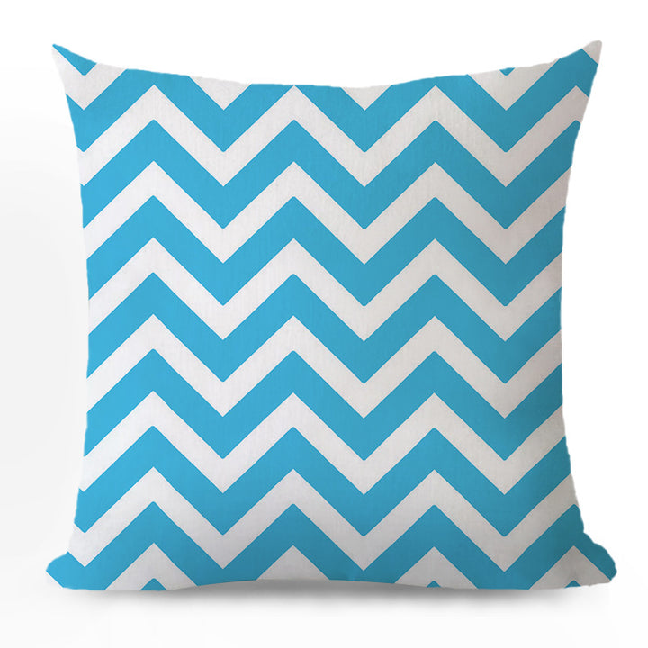 Decorative cushion with zigzag pattern from