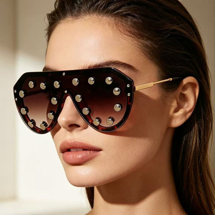 Ladies trendy sunglasses with striking metal elements Stornfield