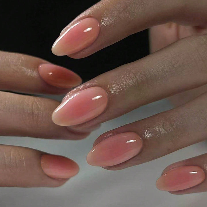 Acrylic nail set with elegant nude ombre effects Stornfield