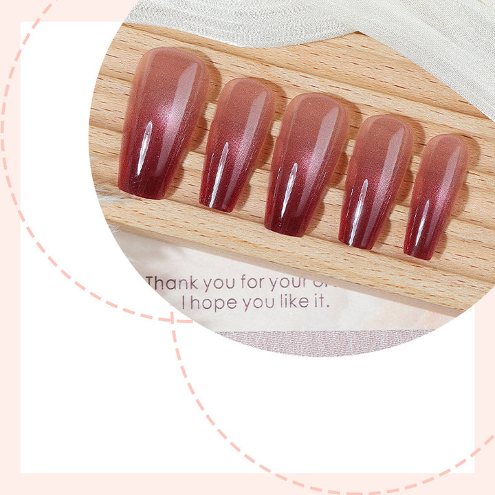 Acrylic nail set with glamorous gradient and glitter accents Stornfield