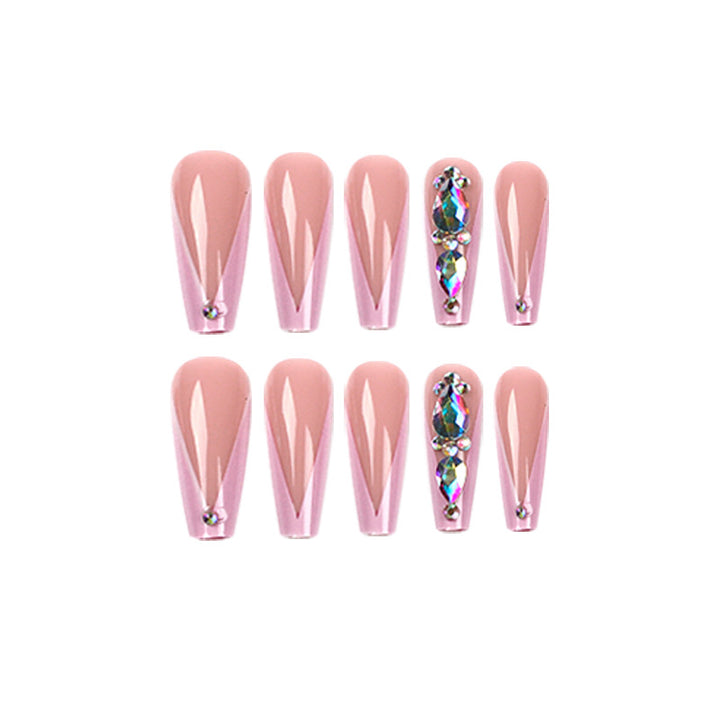 Artful nail extensions with rhinestone and flower accents Stornfield