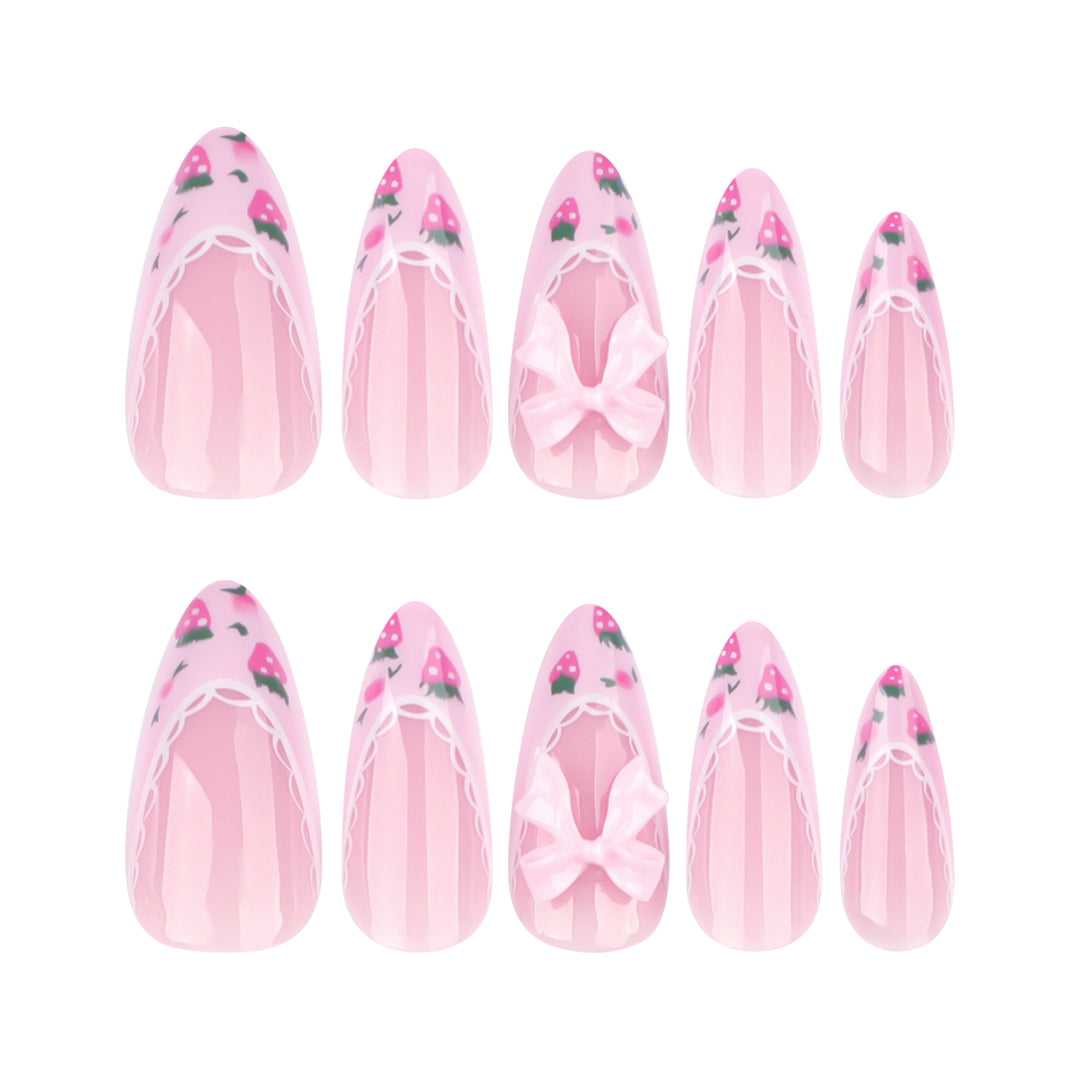 Artful stiletto nails with floral accents and bow embellishments Stornfield