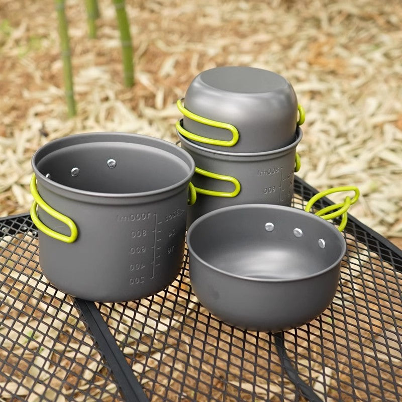 lightweight nesting anodized camping cookware set with folding silicone handles and measurement marks Stornfield