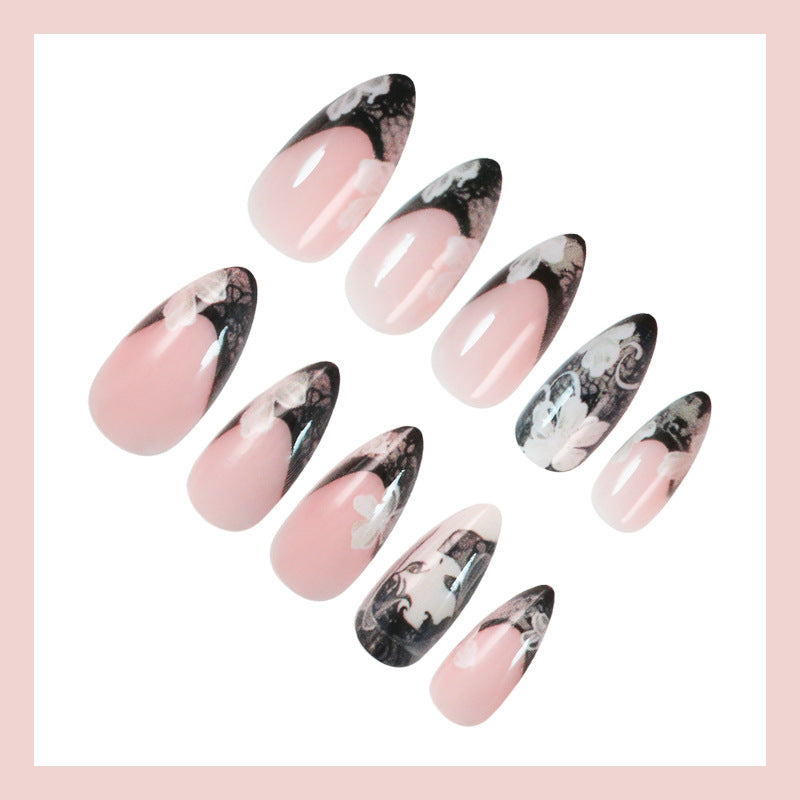Artificial nail set with elegant tips and floral decorations Stornfield