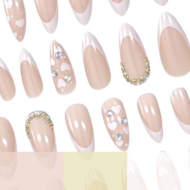 Elegant Almond-Shaped French Tip Nail Art Stornfield