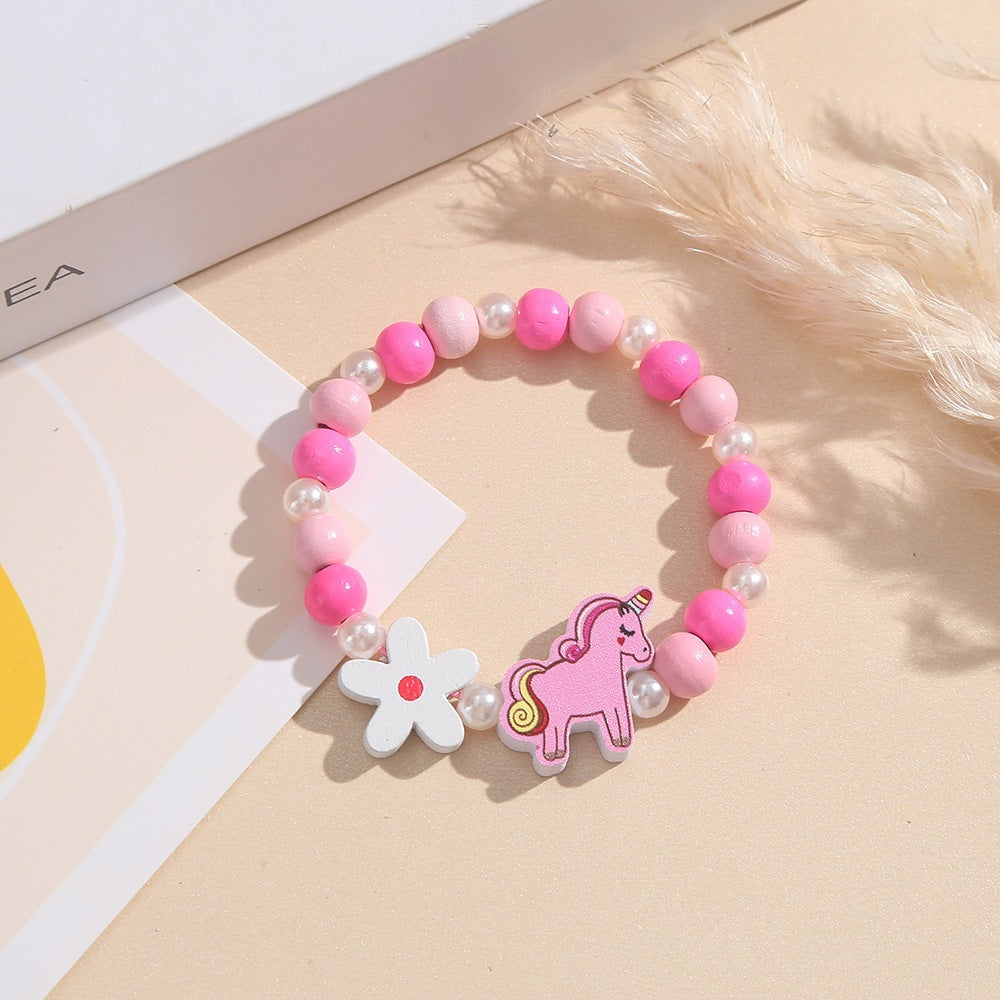 Playful children's bracelet with unicorn and flower motif Stornfield