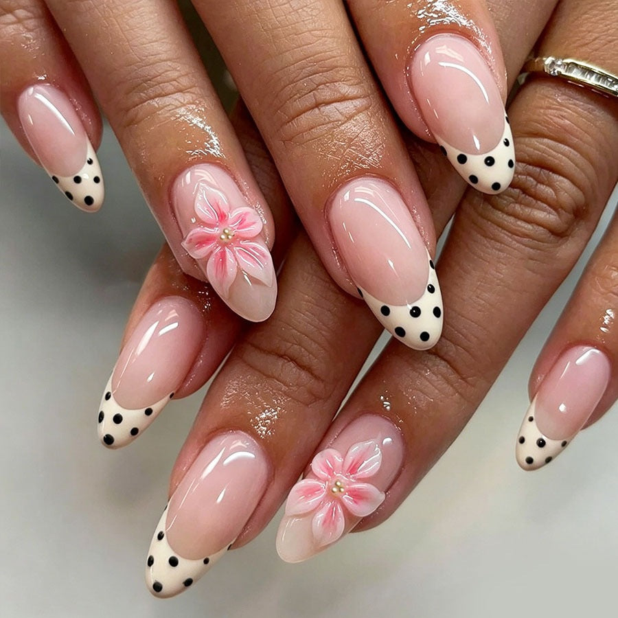 Acrylic nail set with floral accents and dots Stornfield