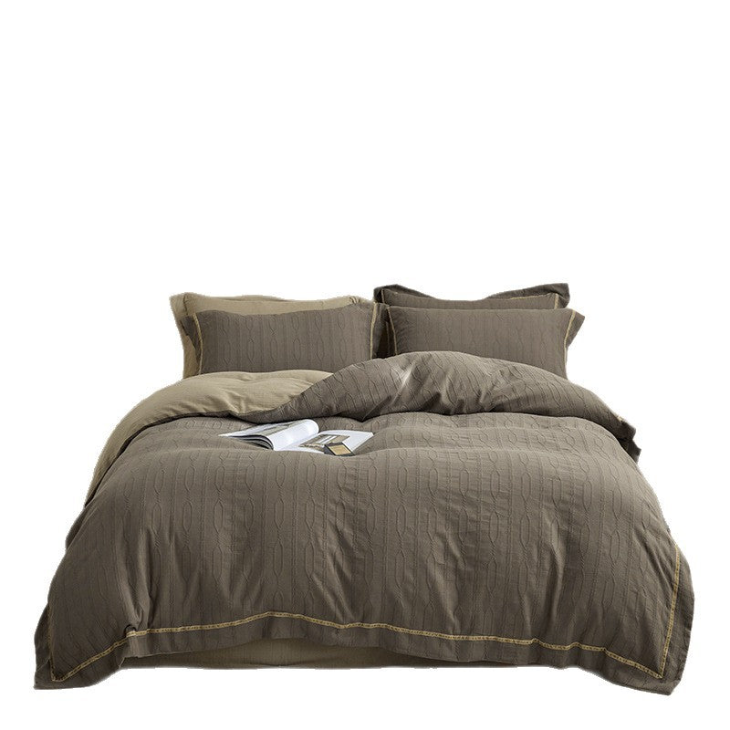 Bedding set made of Mako cotton with fine jacquard quilting and decorative stitching