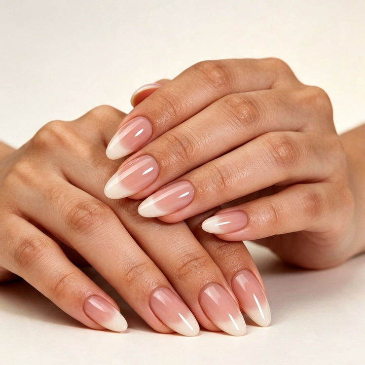 Artificial nails with elegant nude ombre design Stornfield