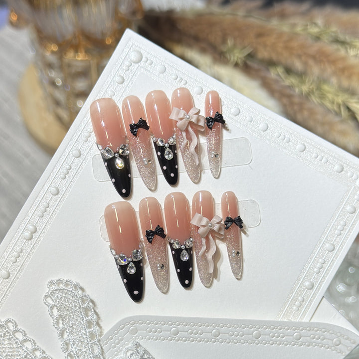 Glamorous Stiletto Press-On Nail Set with Decorative Bow and Gemstone Accents Stornfield